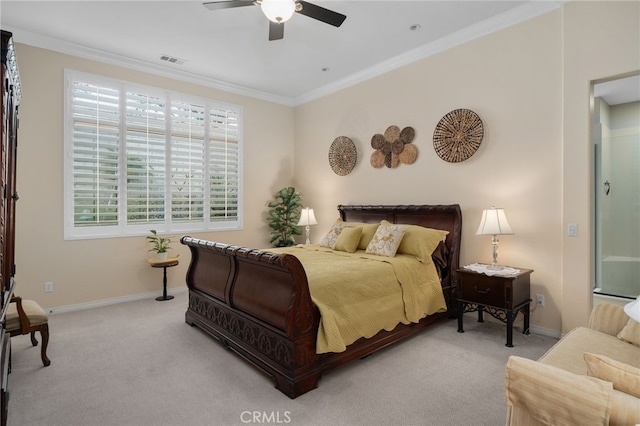 carpeted bedroom featuring crown molding and ceiling fan