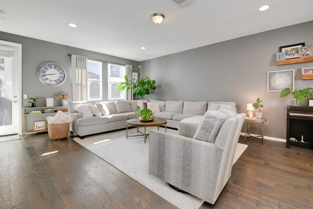 living room featuring dark hardwood / wood-style floors