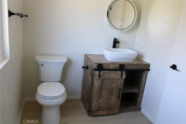 bathroom featuring sink and toilet