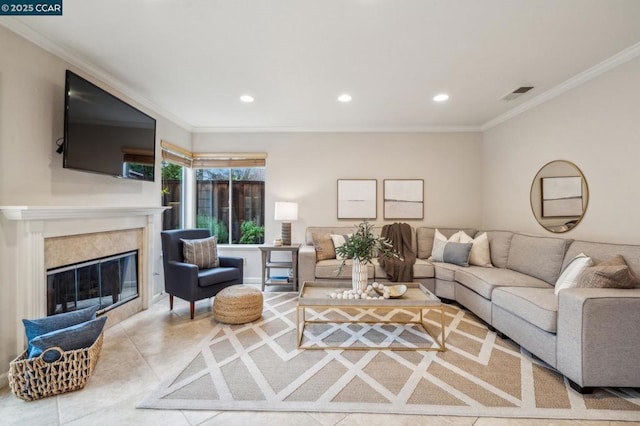 living room featuring tile patterned floors, ornamental molding, and a fireplace