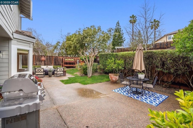 view of patio featuring area for grilling and an outdoor hangout area