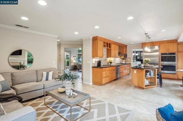 tiled living room featuring crown molding and sink