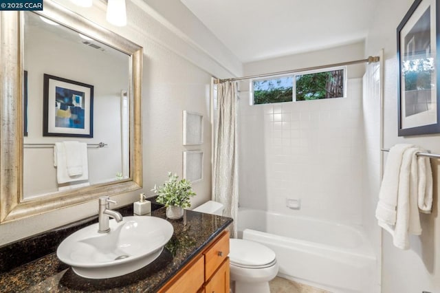 full bathroom with shower / bathtub combination with curtain, vanity, and toilet