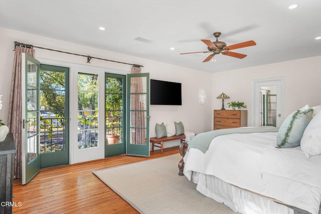 bedroom with ceiling fan, light wood-type flooring, and access to outside