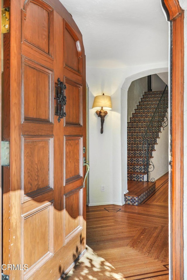 entrance foyer with parquet flooring