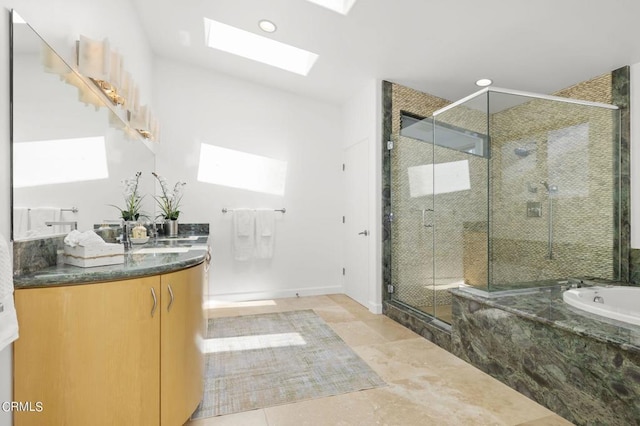 bathroom with vanity, tile patterned floors, and plus walk in shower