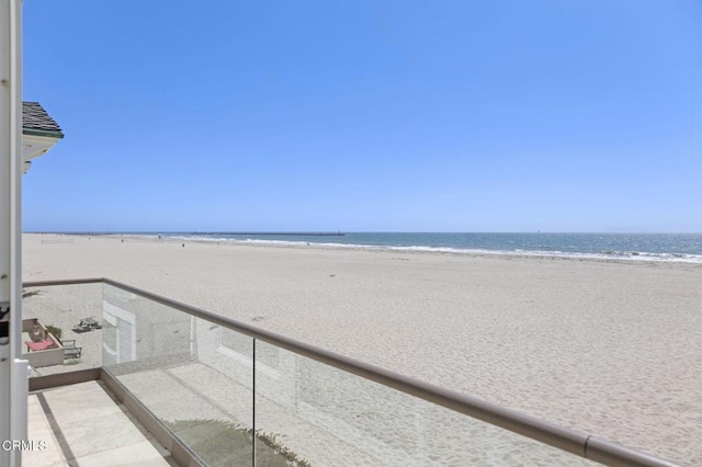 property view of water featuring a beach view