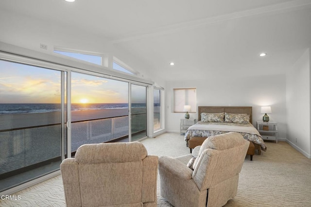 carpeted bedroom featuring vaulted ceiling, a water view, and access to exterior