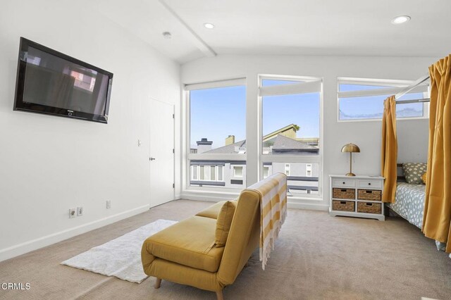 3757 Ocean Dr, Oxnard, CA 93035 - living area with carpet floors, plenty of natural light, and recessed lighting