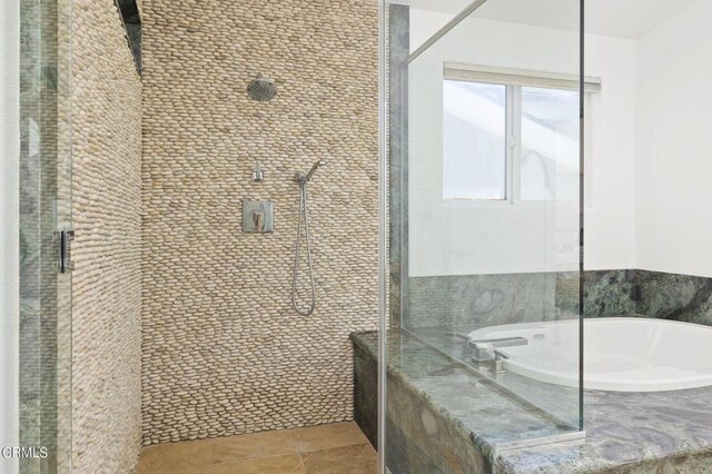 3757 Ocean Dr, Oxnard, CA 93035 - full bathroom featuring a stall shower, a bath, and tile patterned flooring