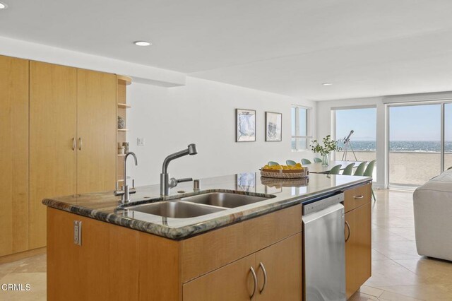 3757 Ocean Dr, Oxnard, CA 93035 - kitchen featuring stainless steel dishwasher, dark stone counters, recessed lighting, open shelves, and light tile patterned floors
