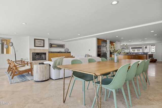 3757 Ocean Dr, Oxnard, CA 93035 - dining space featuring recessed lighting and a glass covered fireplace