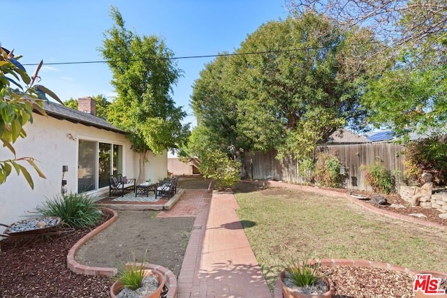 view of yard featuring a patio