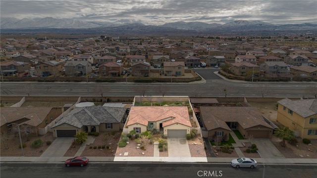 drone / aerial view featuring a mountain view