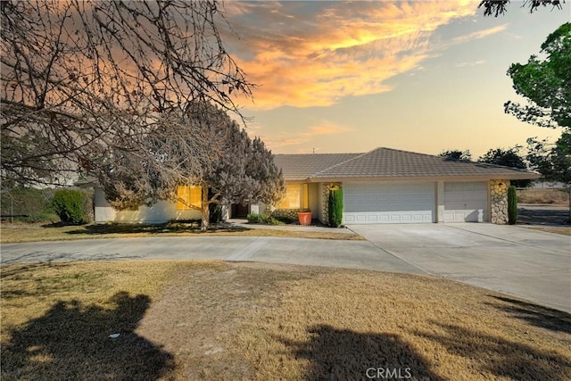 view of front of property with a garage