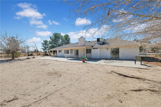 rear view of property with a patio area