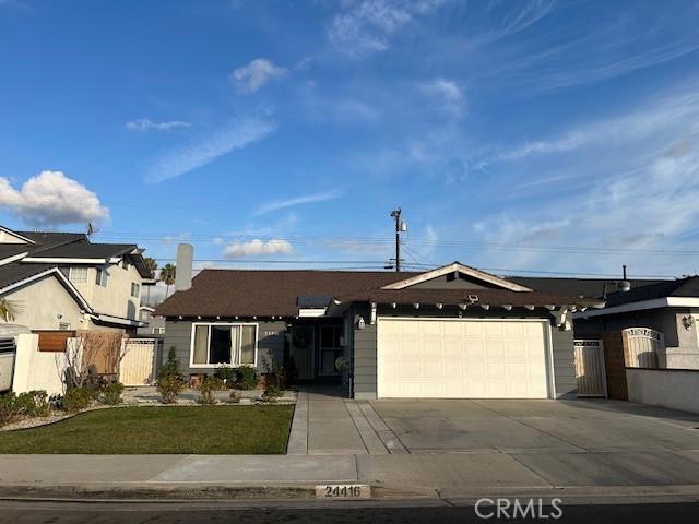 single story home featuring a garage