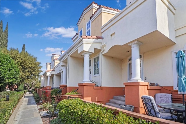 view of home's exterior with stucco siding