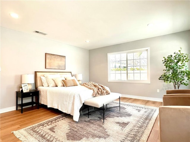 bedroom featuring hardwood / wood-style flooring