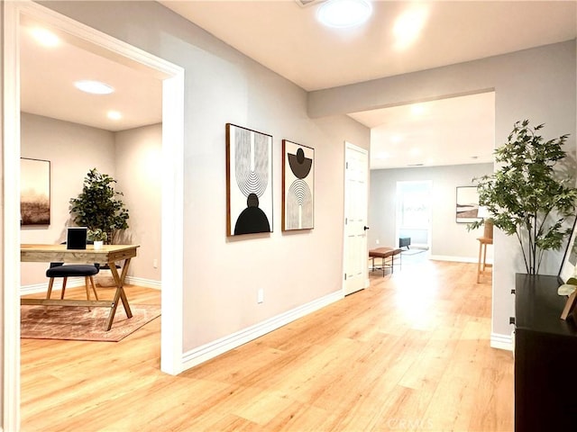 hall featuring light wood-type flooring