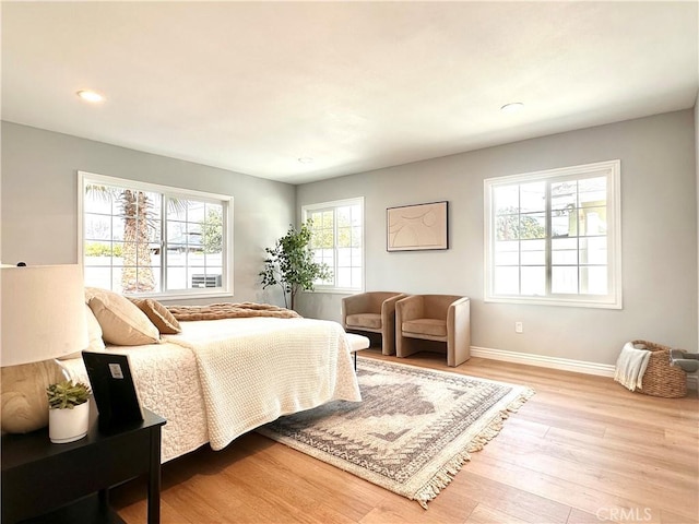 bedroom featuring light hardwood / wood-style floors