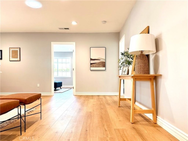 corridor featuring light hardwood / wood-style flooring