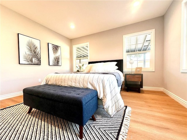 bedroom featuring light wood-type flooring