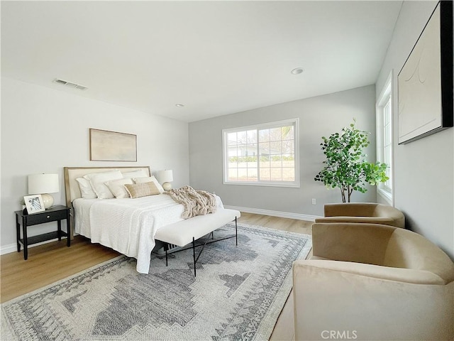 bedroom featuring hardwood / wood-style floors