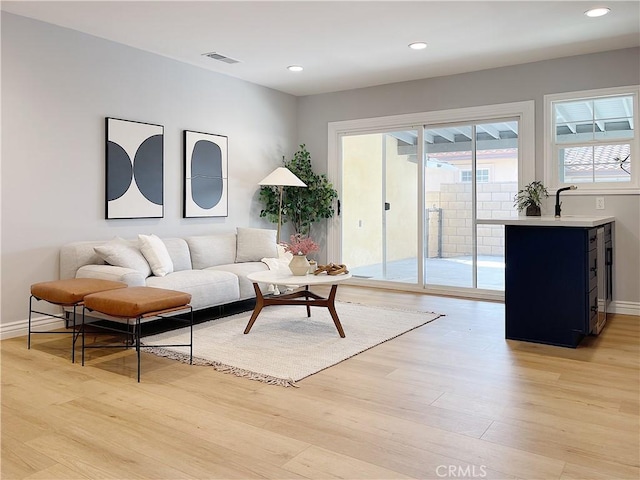 living room featuring light wood-type flooring