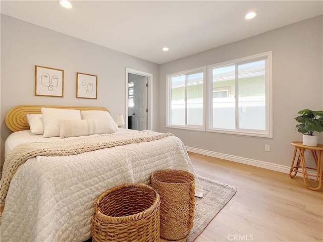 bedroom featuring light wood-type flooring