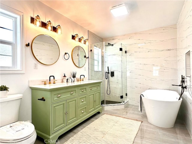 full bathroom featuring independent shower and bath, vanity, lofted ceiling, and a healthy amount of sunlight