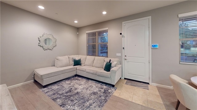 living room with light hardwood / wood-style flooring