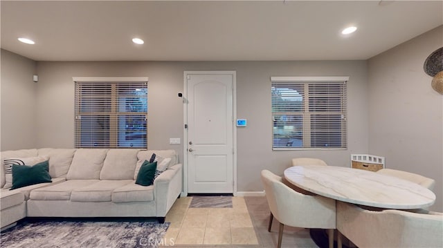 dining space with light tile patterned flooring