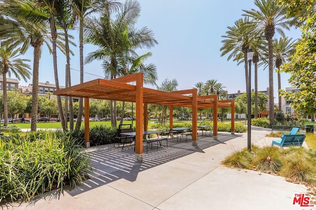 view of home's community featuring a pergola