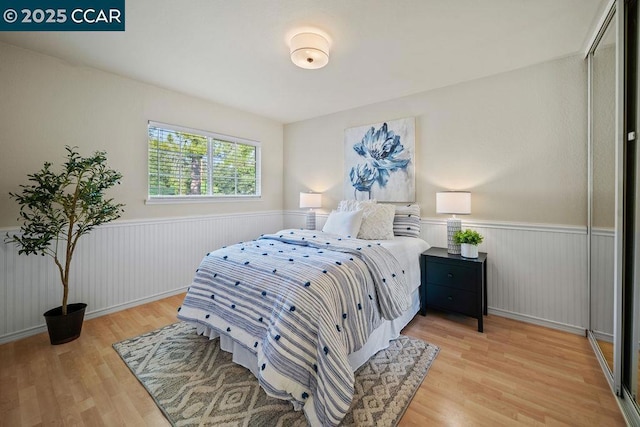 bedroom featuring light wood-type flooring