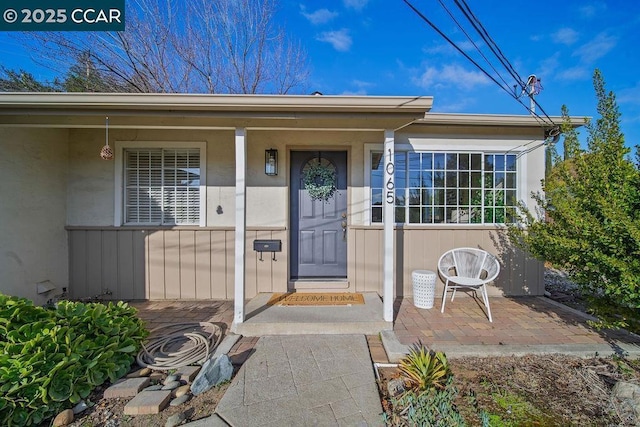 property entrance with a porch