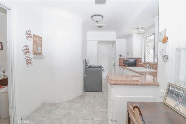 bathroom featuring vanity and tile patterned floors