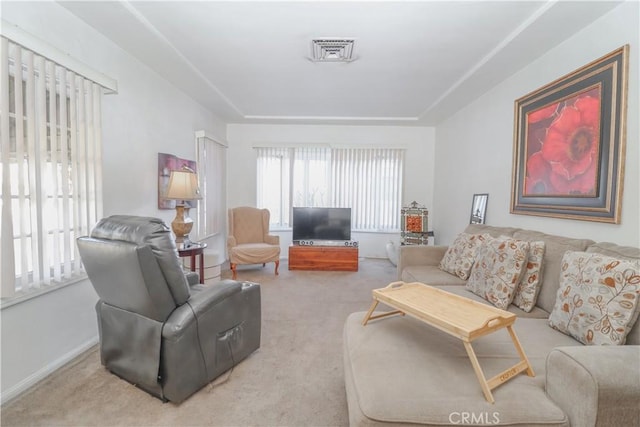 living room featuring light colored carpet