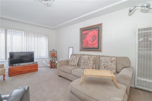 living room featuring light colored carpet