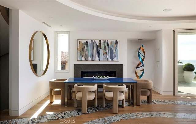 dining area featuring light wood-type flooring