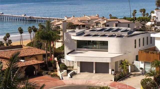 drone / aerial view with a view of the beach and a water view