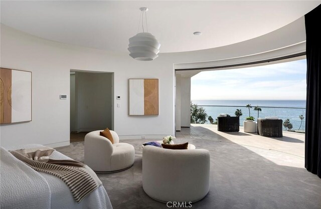 living room featuring a water view