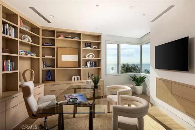 sitting room featuring hardwood / wood-style flooring