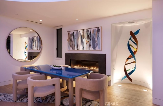 dining area with light wood-type flooring