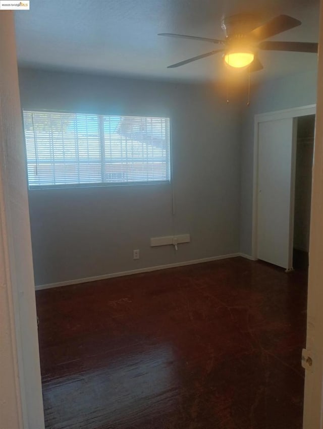 empty room featuring ceiling fan