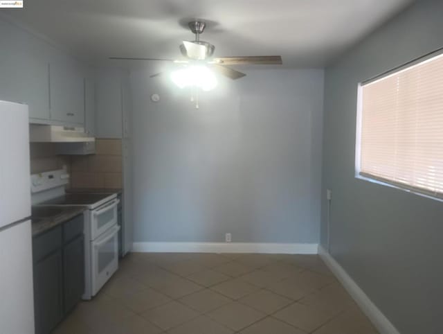 kitchen featuring tasteful backsplash, white appliances, ceiling fan, and white cabinets