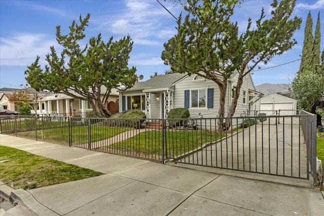 view of front of house featuring a garage, an outdoor structure, and a front lawn