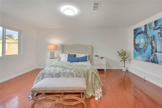 bedroom featuring hardwood / wood-style floors