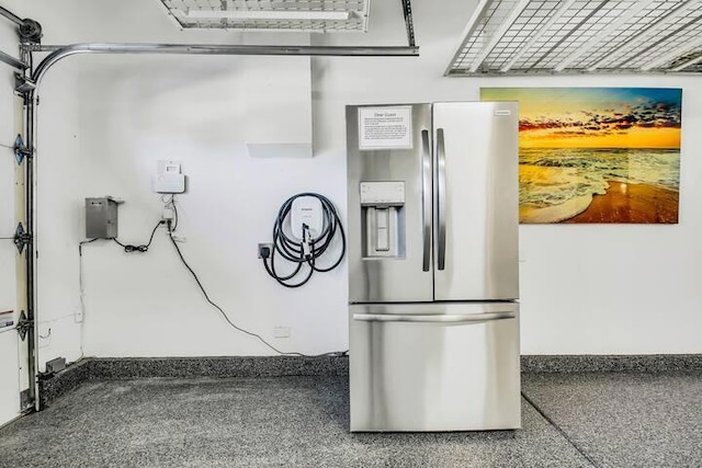 details featuring stainless steel fridge with ice dispenser