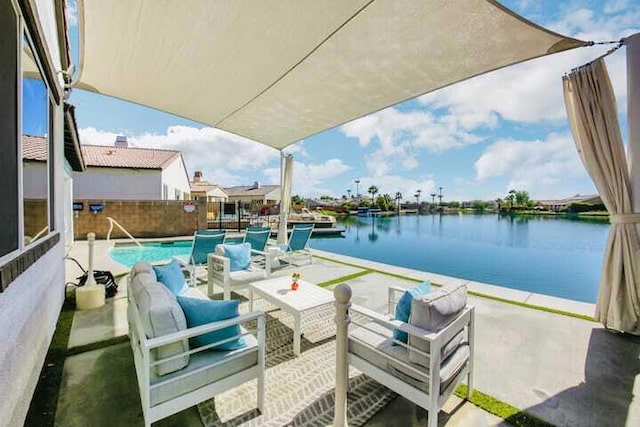 balcony featuring a patio and a water view